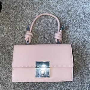 Never used. Can be used as crossbody or Handbag